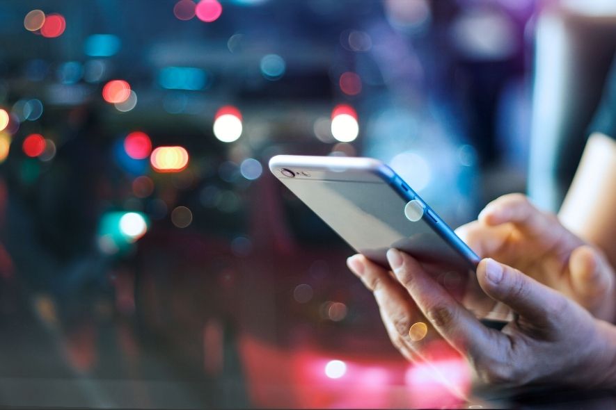 person using smart phone