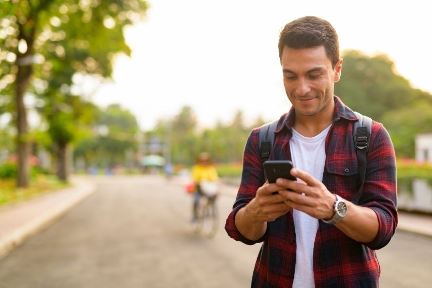 young man on his phone