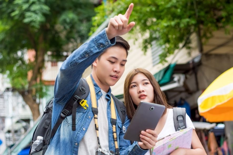 two young people looking for a branch